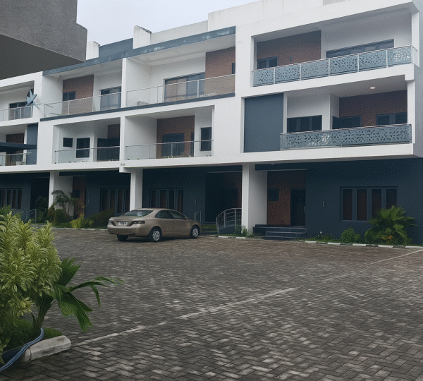 Modern Townhouse Complex with Cobblestone Driveway